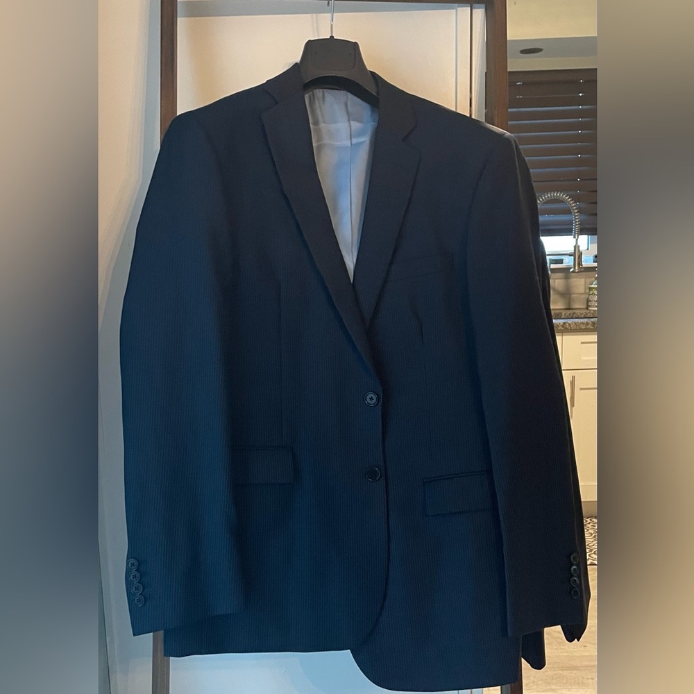 New with tags Charles Tyrwhitt Navy Blue pinstripe suit with baby blue lining